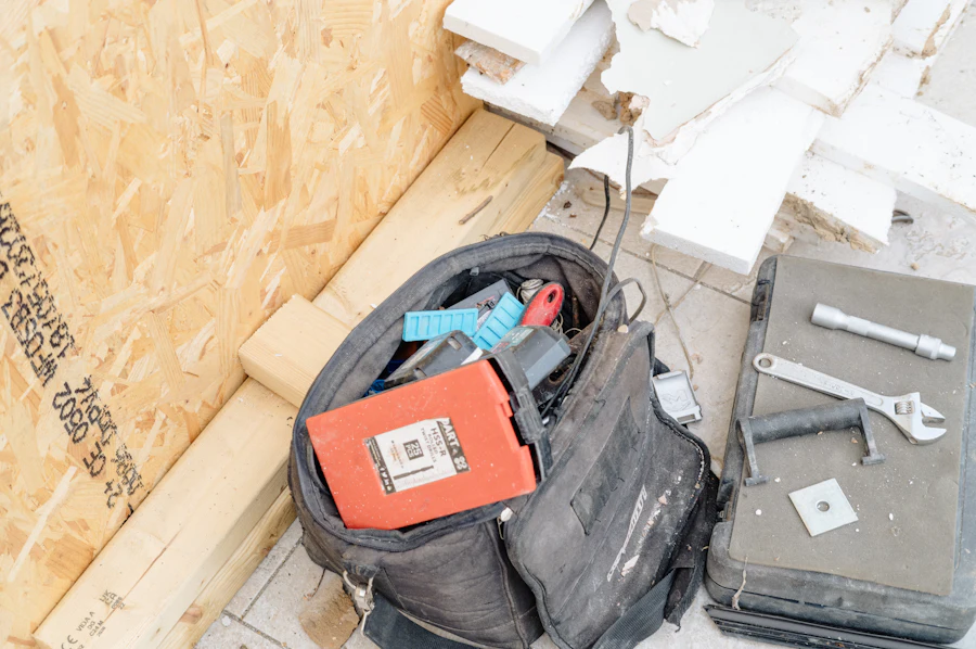 An open tool bag on a building site